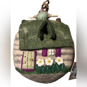 Wild Woolies Felt Bird house. Place seeds in top opening for small birds.